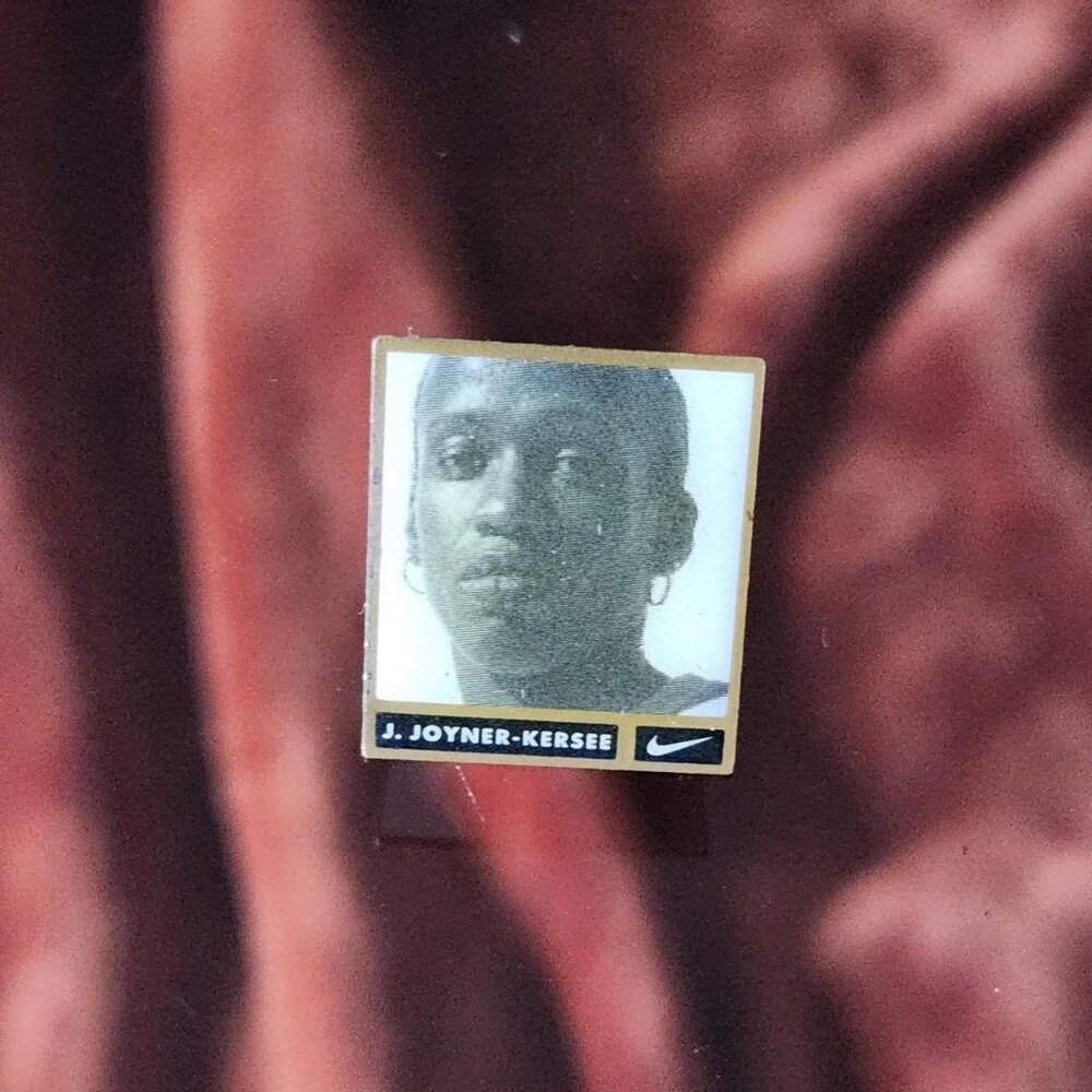 Vintage NIKE Jackie Joyner-Kersee metal pin.